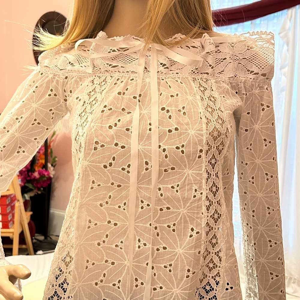 Lacey long sleeve top with exposed shoulders